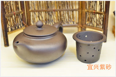 Teiera autentica di Yixing di uso collettivo di arte, modello porpora di abitudine della teiera della sabbia